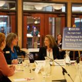 Rep. Craig sitting at table