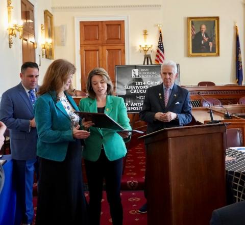 Rep. Craig presenting Bard Hedstrom with the award