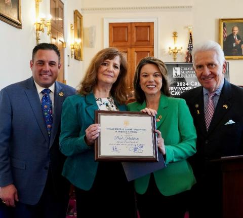 Rep. Craig and Bard Hedstrom with the award
