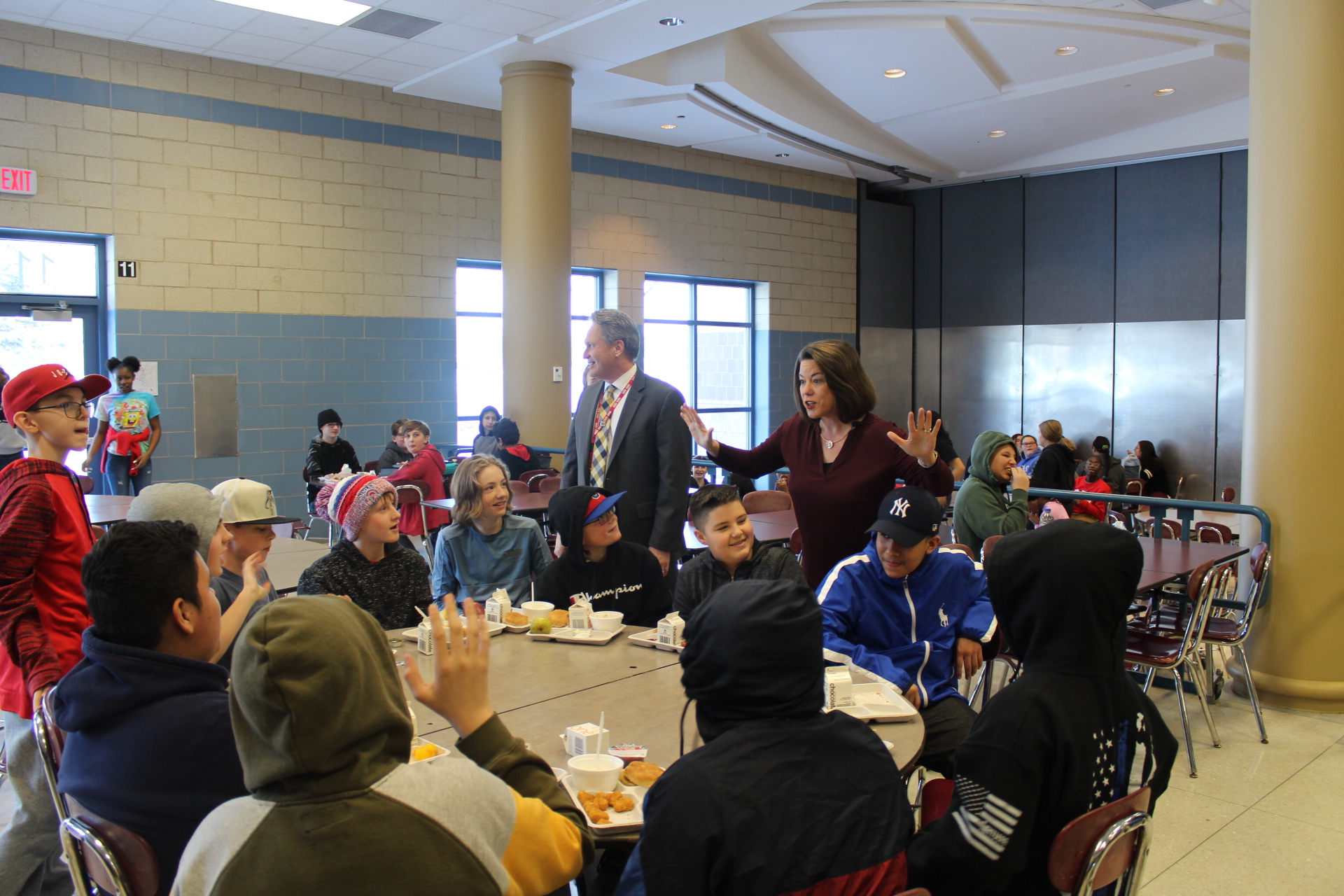Rep. Angie Craig talking to students during lunch time
